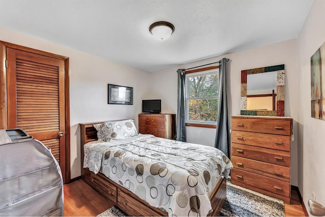 bedroom featuring hardwood / wood-style floors