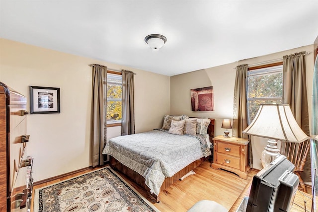 bedroom featuring wood-type flooring