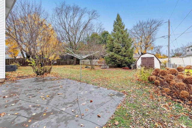 view of patio with a storage shed