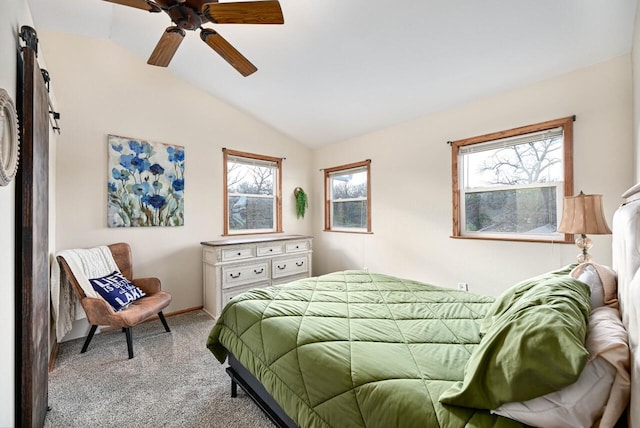 bedroom featuring ceiling fan, light carpet, and vaulted ceiling