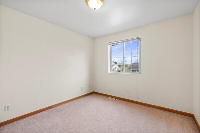 view of carpeted spare room