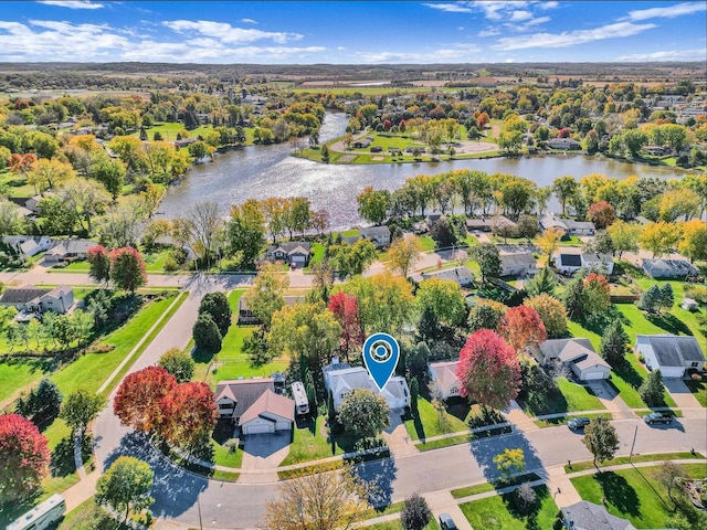 bird's eye view with a water view