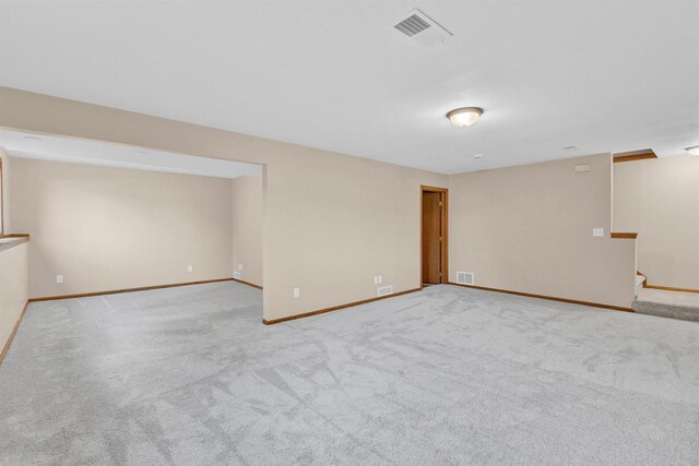 basement with light carpet