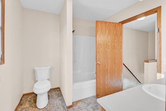 full bathroom featuring vanity, shower / bathtub combination, and toilet