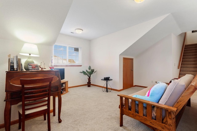 sitting room with light colored carpet