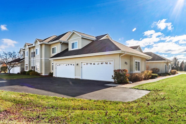 front of property with a garage