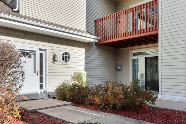 entrance to property with a balcony