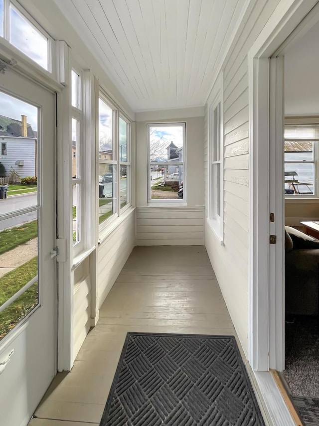 sunroom with wood ceiling