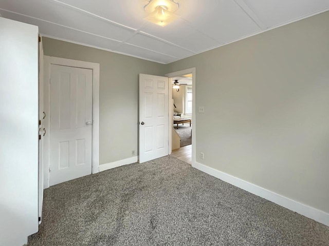 unfurnished bedroom featuring carpet floors