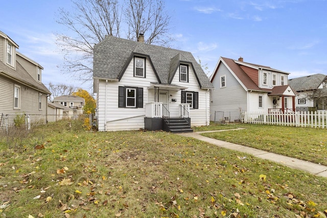 view of front of home featuring a front yard