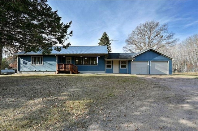 single story home with a garage