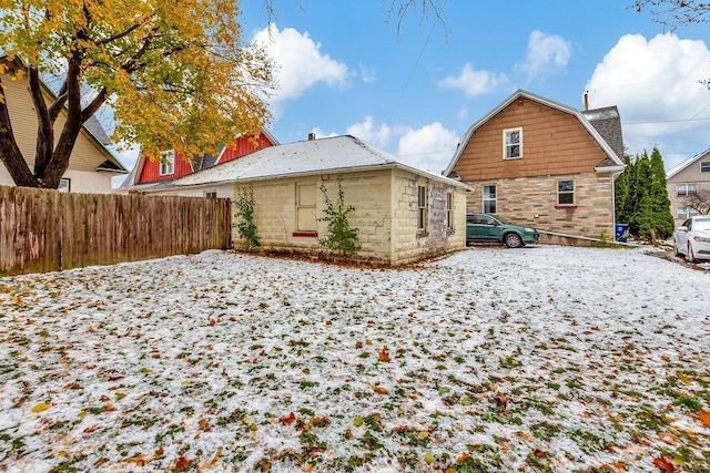 view of snow covered house