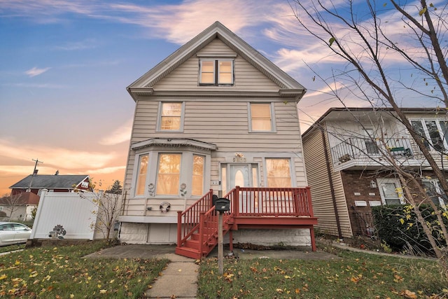 view of front of house with a yard