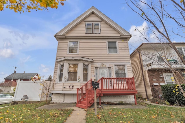 view of property with a front lawn