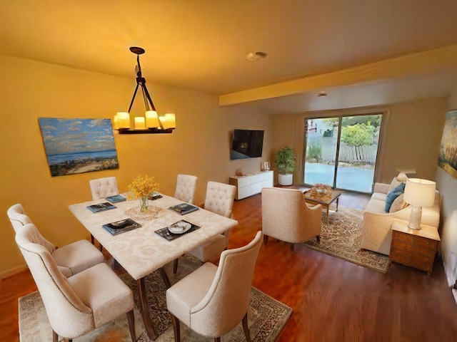 dining room with dark hardwood / wood-style flooring and a chandelier