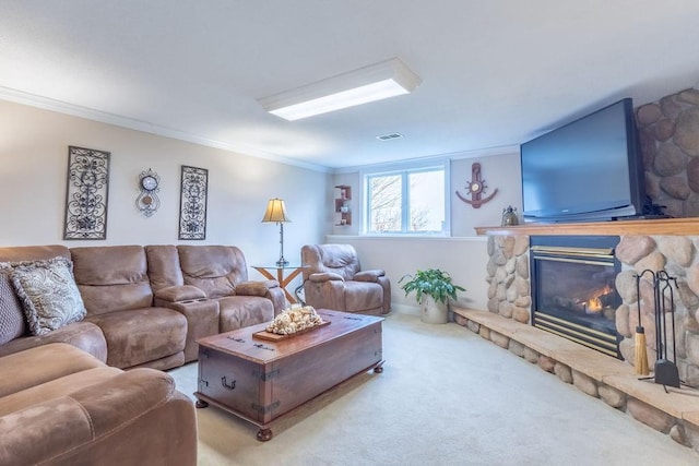 living room featuring carpet flooring, a fireplace, and ornamental molding