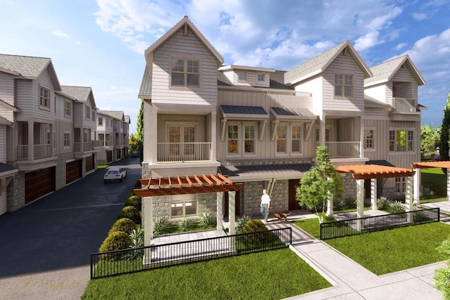 view of front of house featuring a front yard and a garage