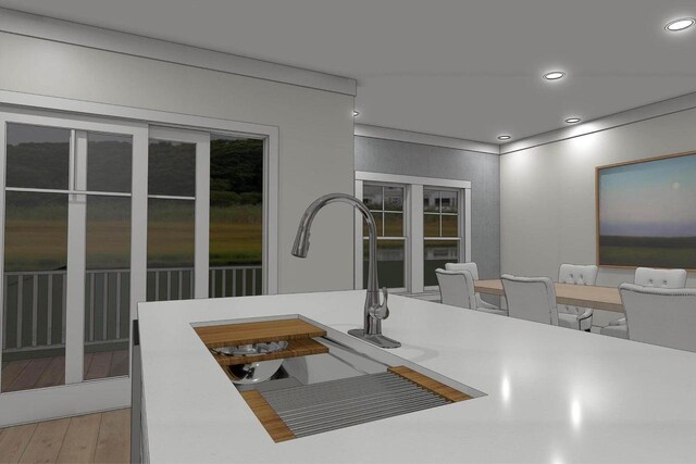 227 3rd Ave Unit 19, Fontana, WI 53125 - kitchen with recessed lighting, wood finished floors, and light countertops