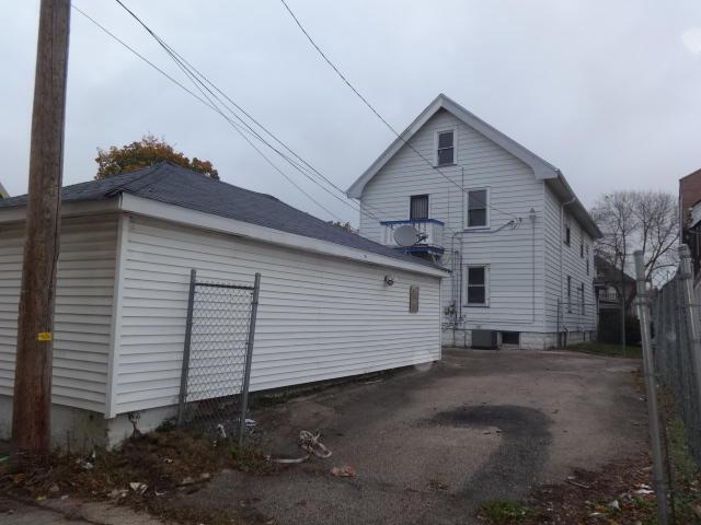 2977 N 26th St Unit 2979, Milwaukee, WI 53206 - rear view of property with central air condition unit