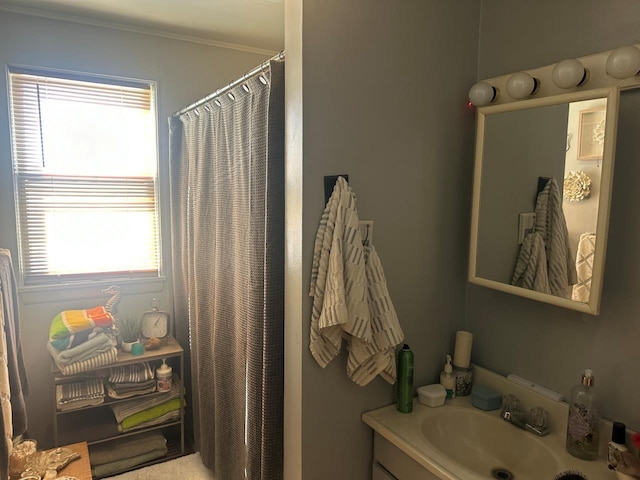 bathroom with vanity and walk in shower