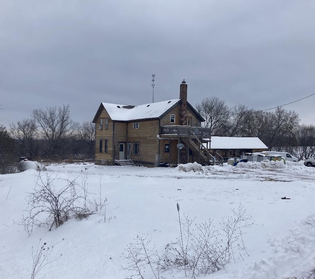 view of snow covered property