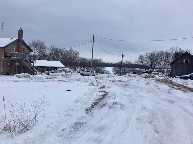 view of yard covered in snow