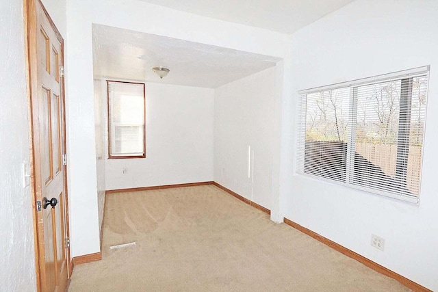 view of carpeted spare room