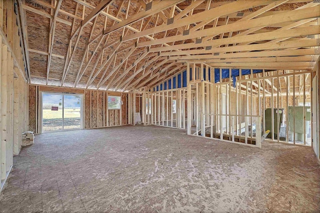 miscellaneous room with lofted ceiling