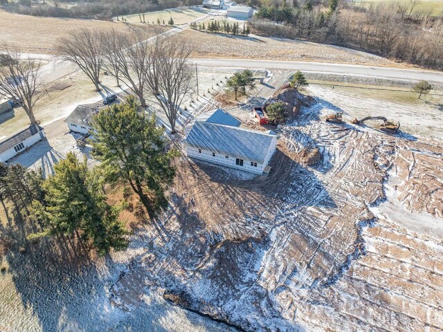 birds eye view of property featuring a rural view