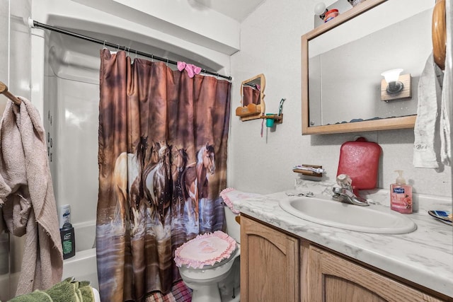 full bathroom with toilet, vanity, and shower / tub combo