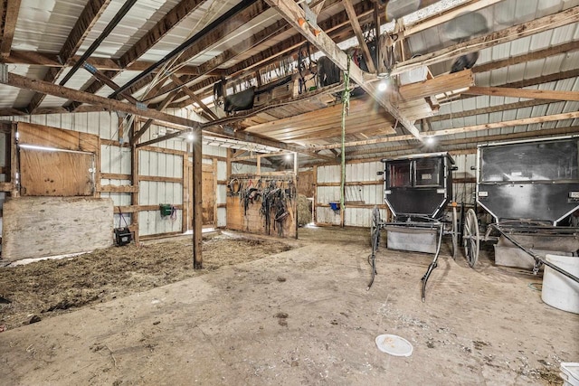 miscellaneous room featuring lofted ceiling