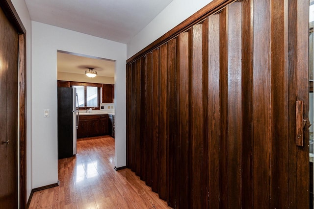 hall featuring light hardwood / wood-style floors