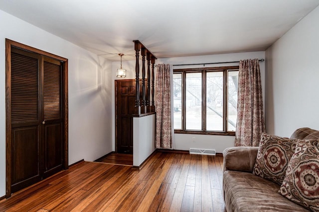 interior space with dark hardwood / wood-style floors