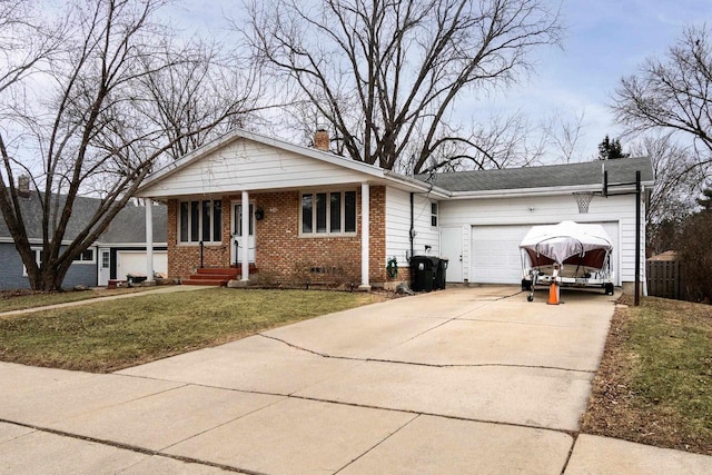 view of front facade with a garage and a front lawn