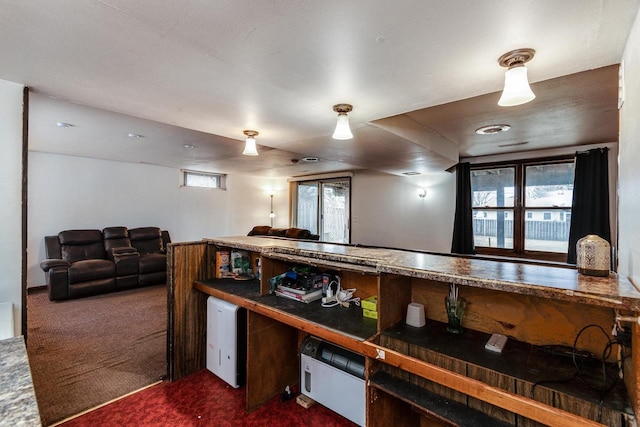 kitchen featuring dark carpet