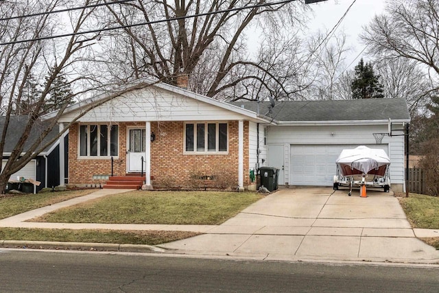 view of front of home with a garage and a front lawn