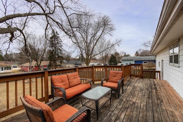 deck featuring outdoor lounge area