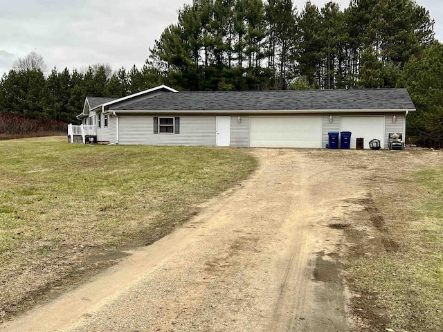 garage with a yard