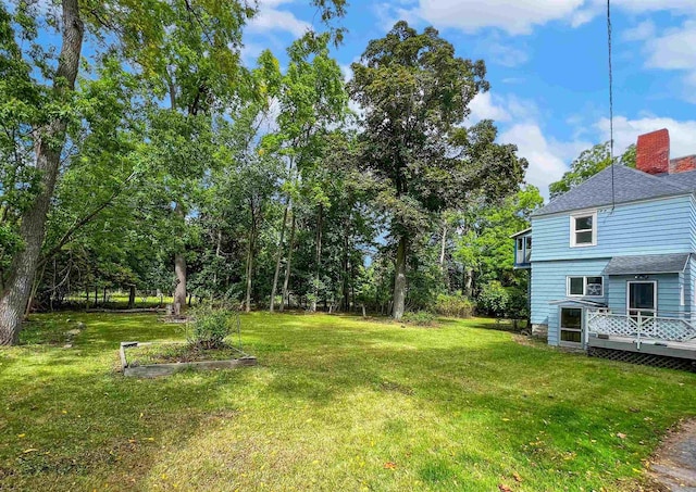 view of yard featuring a deck
