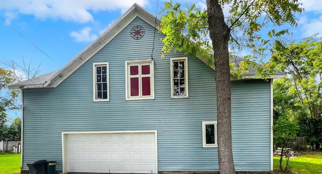 view of property exterior featuring a garage