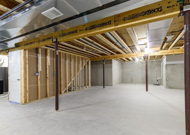 unfinished basement with visible vents