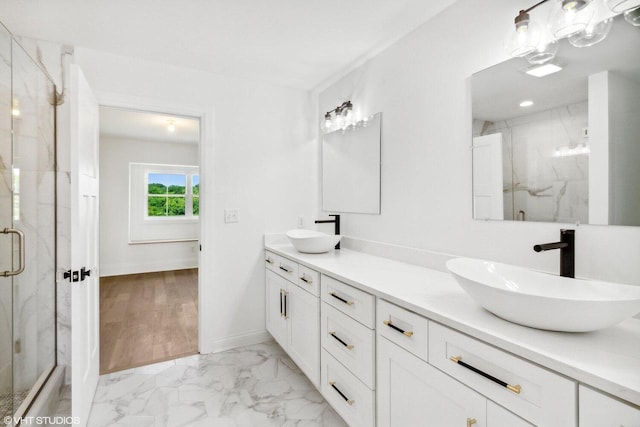 649 Eagleton Dr Unit 55-14, Lake Geneva, WI 53147 - full bath featuring marble finish floors, double vanity, a marble finish shower, and baseboards