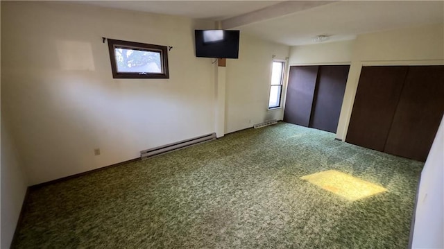 unfurnished room featuring carpet, baseboard heating, and beamed ceiling