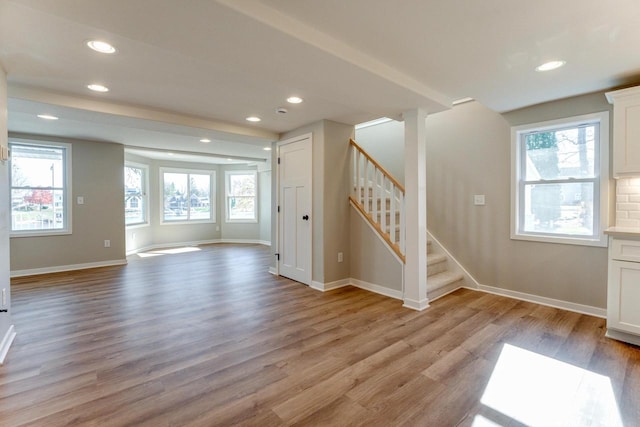 interior space featuring a healthy amount of sunlight and light hardwood / wood-style floors