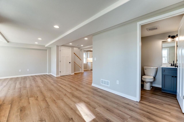 interior space featuring light hardwood / wood-style flooring and sink