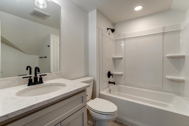 full bathroom featuring vanity, shower / bathtub combination, and toilet