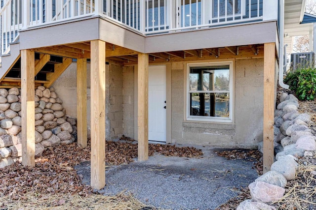 doorway to property featuring a wooden deck