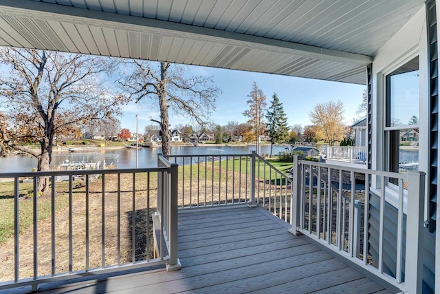 deck featuring a water view