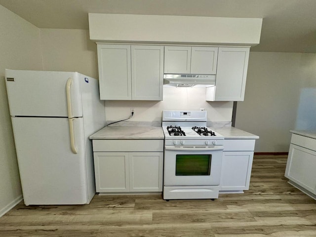 kitchen with white cabinetry, light hardwood / wood-style flooring, and white appliances