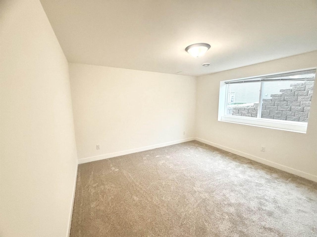 empty room with carpet flooring